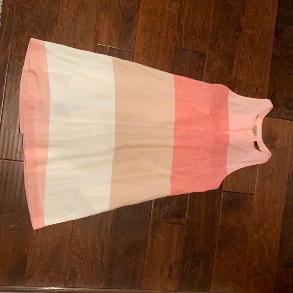 Linen sundress with fun back! Lined with pockets!